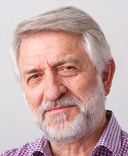 Headshot of Ben for perforation of the bowel case study